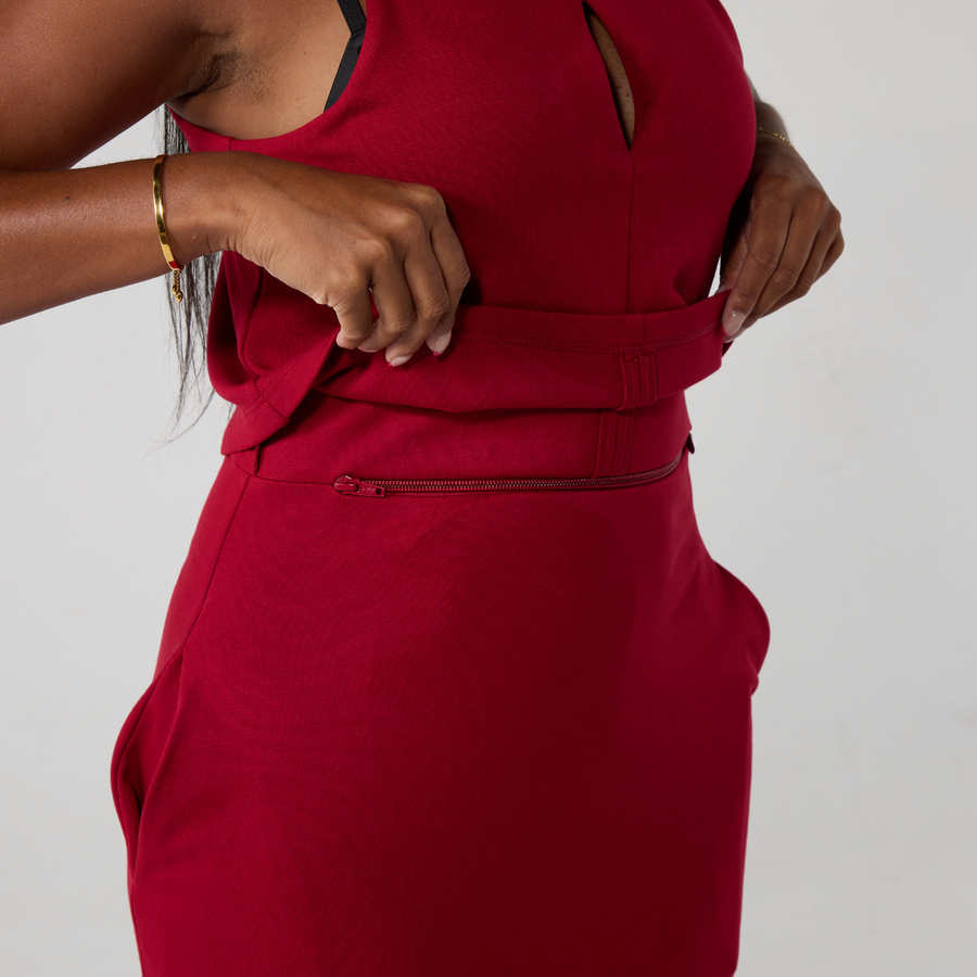 Close up of the hidden zip opening at the waist of the dress that allows stoma and tube access.